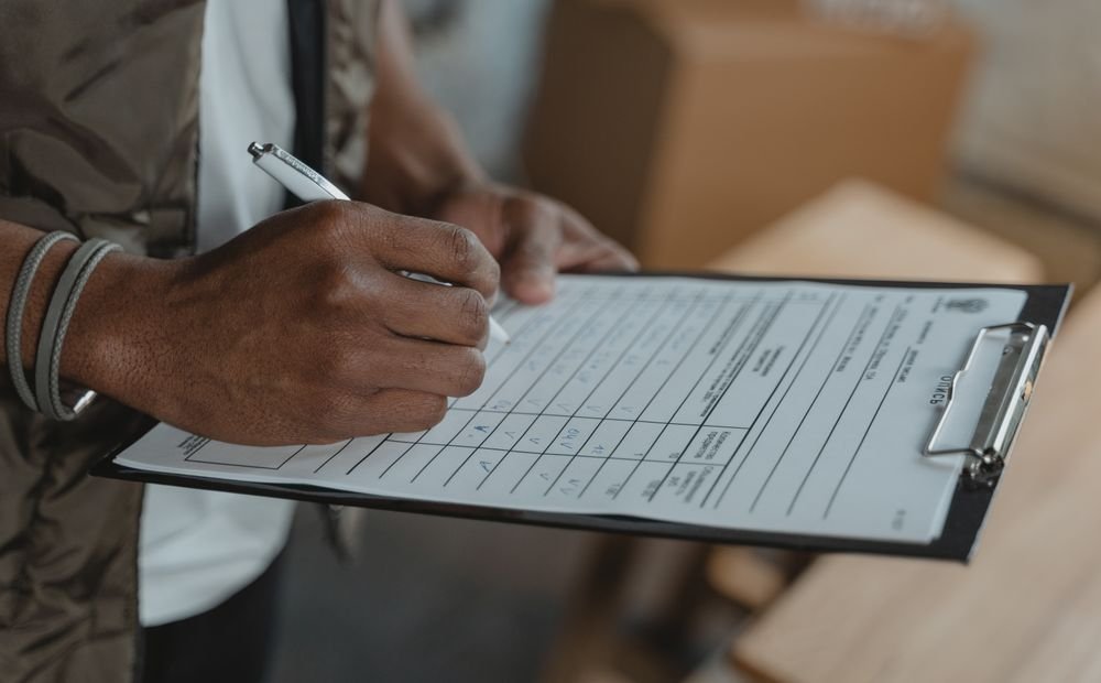 Business owner reviewing findings and priorities at a desk