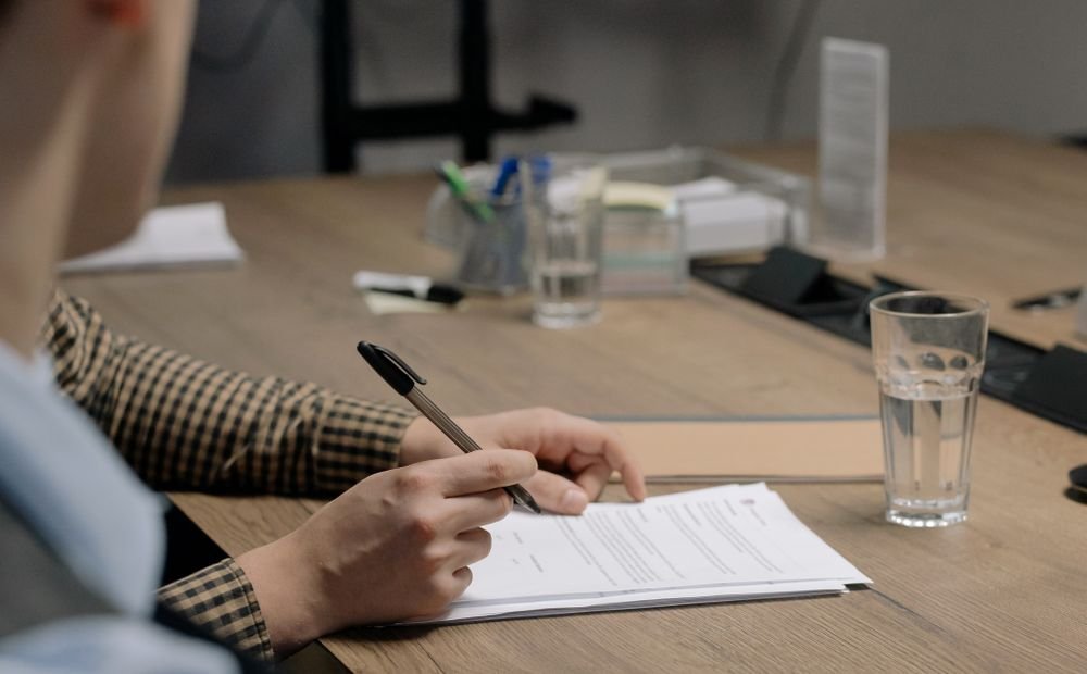 Office desk with paperwork representing NAP consistency issues across business listings Office desk with paperwork representing NAP consistency issues across business listings